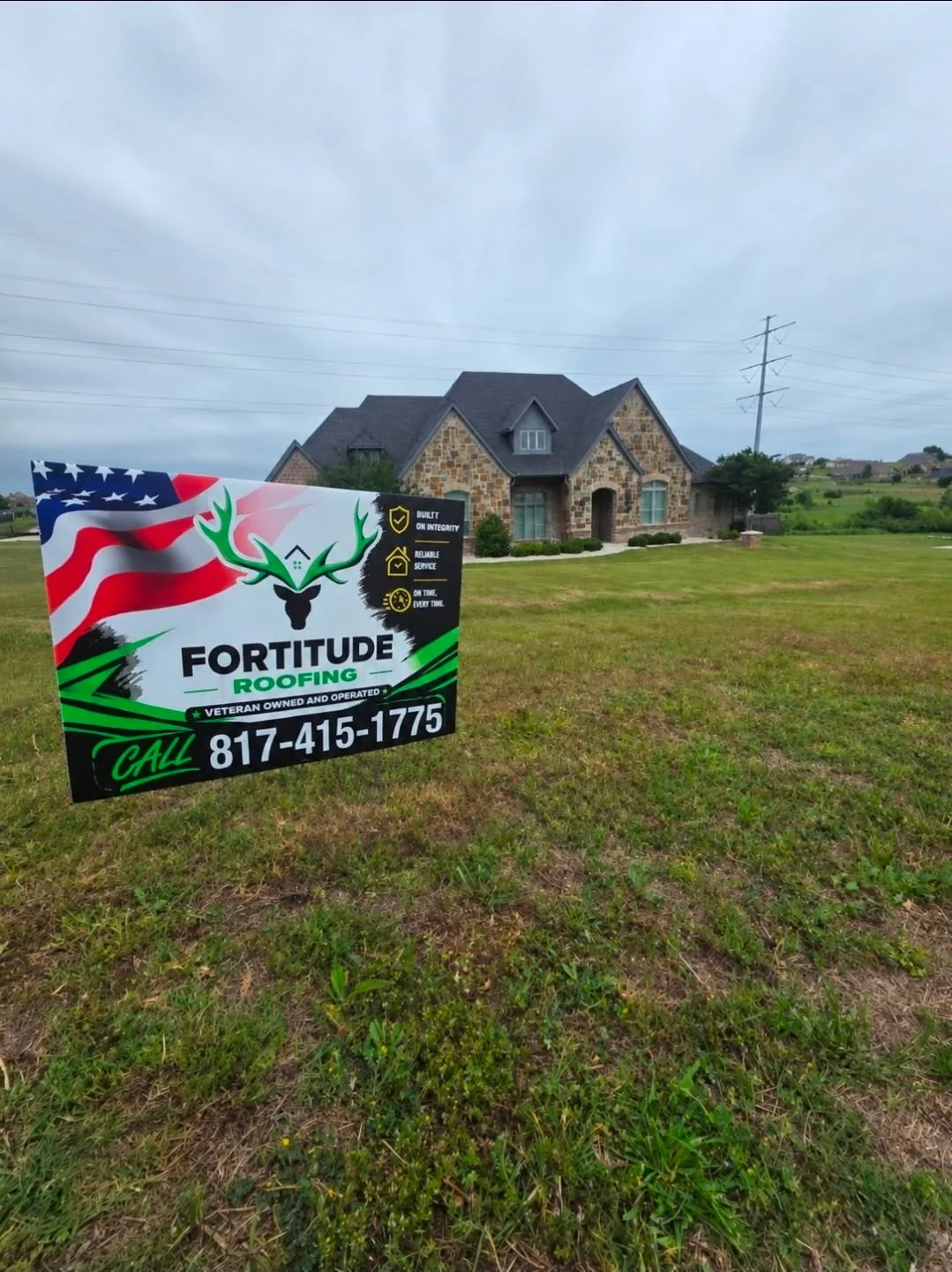 Fortitude Roofing yard sign displayed in front of a home in North Texas